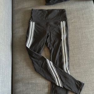 Athleta XXS black leggings with white stripe and mesh